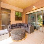 Marrakech concierge helping a traveler avoid common mistakes with a checklist – Your Host Marrakech