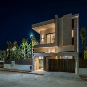 A Your Host Marrakech concierge thoughtfully curating a collection of unique experiences for a client.