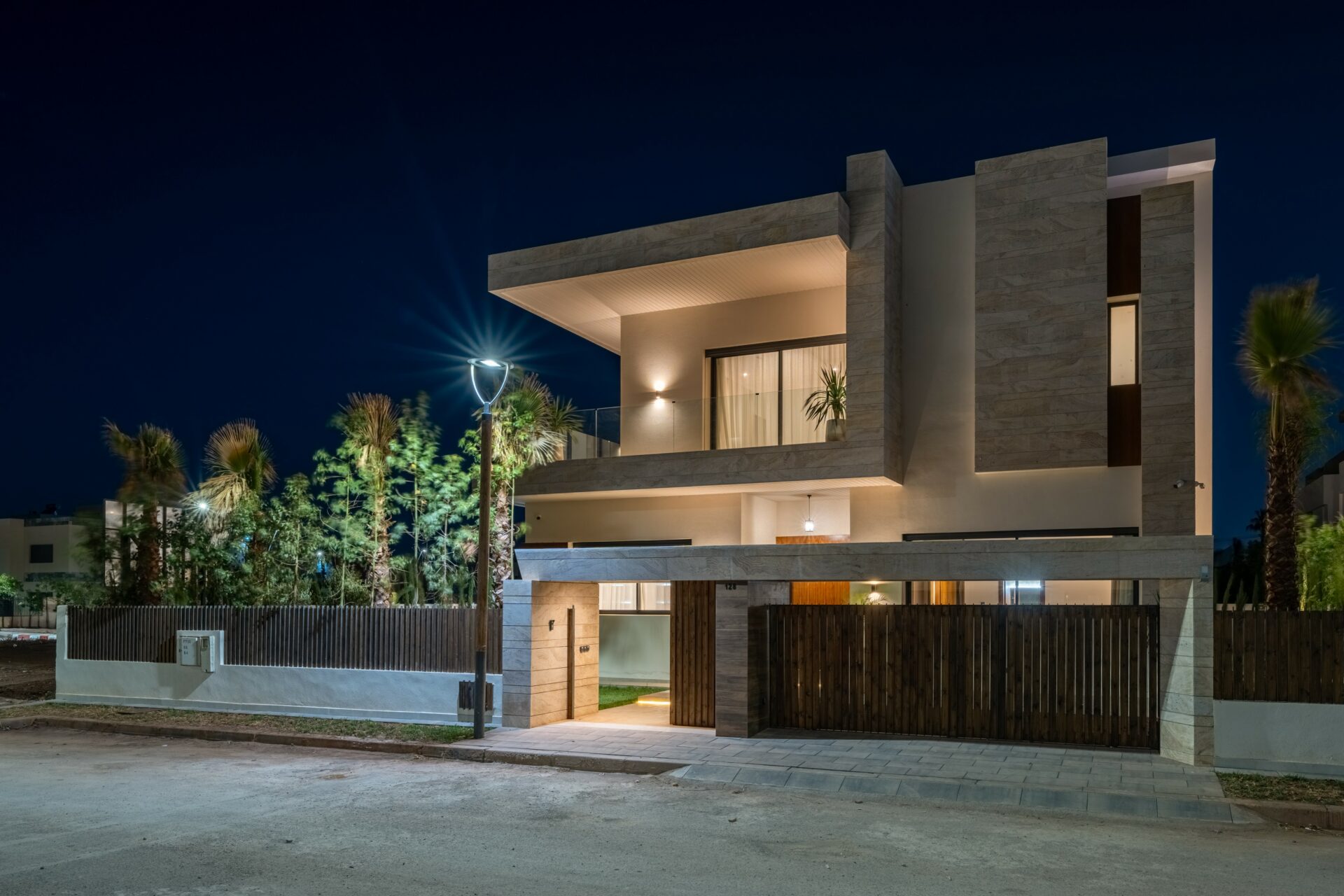 A Your Host Marrakech concierge thoughtfully curating a collection of unique experiences for a client.